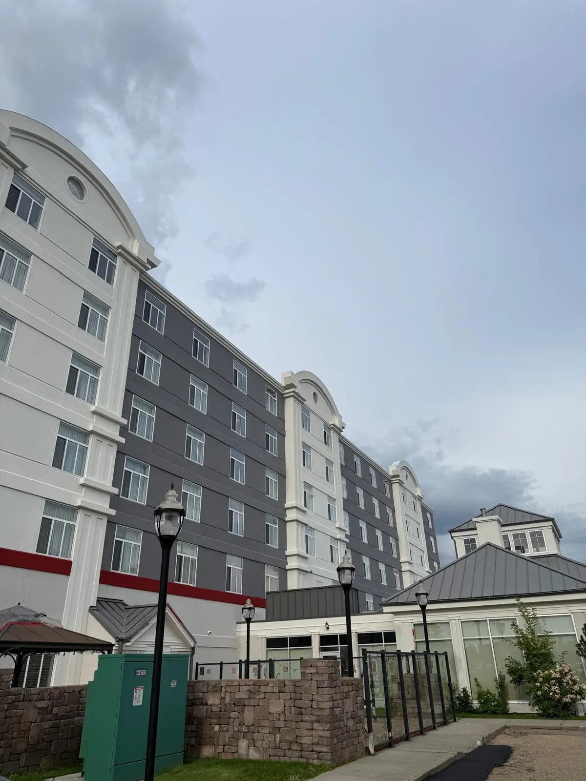 Hilton Garden Inn, Edmonton — Approach past the terrace, three arched parapets in line