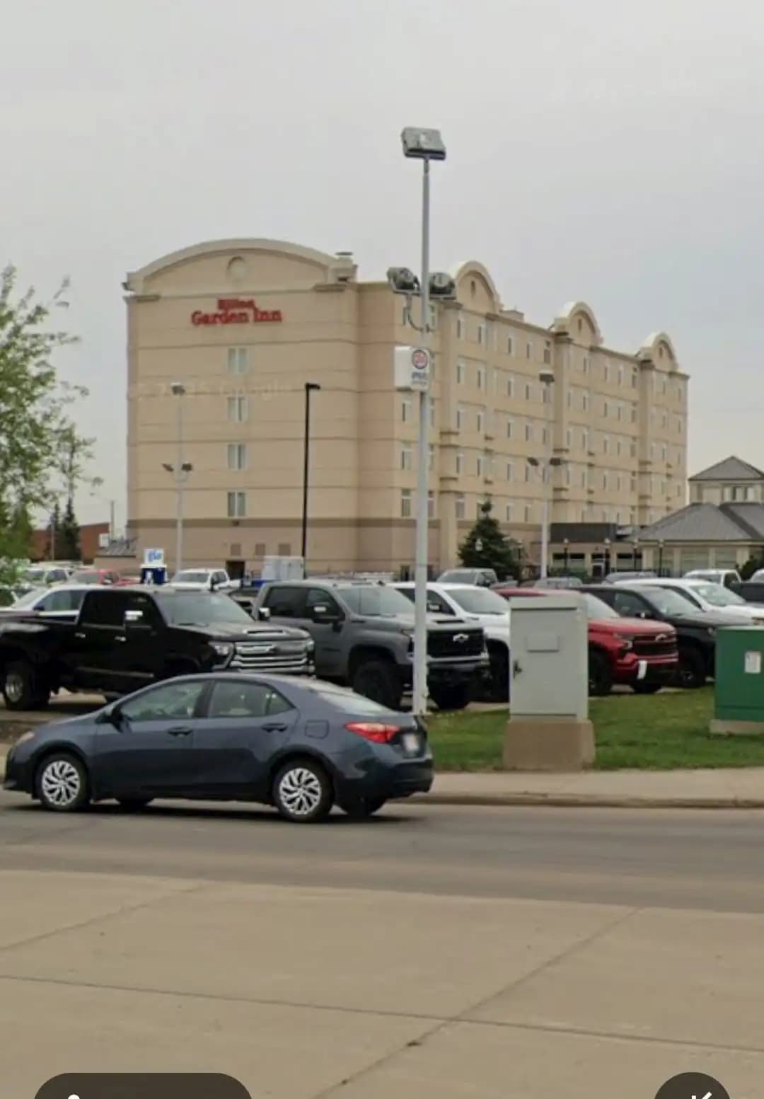 Hilton Garden Inn, Edmonton — Before: beige field, beige mouldings, from Stony Plain Road