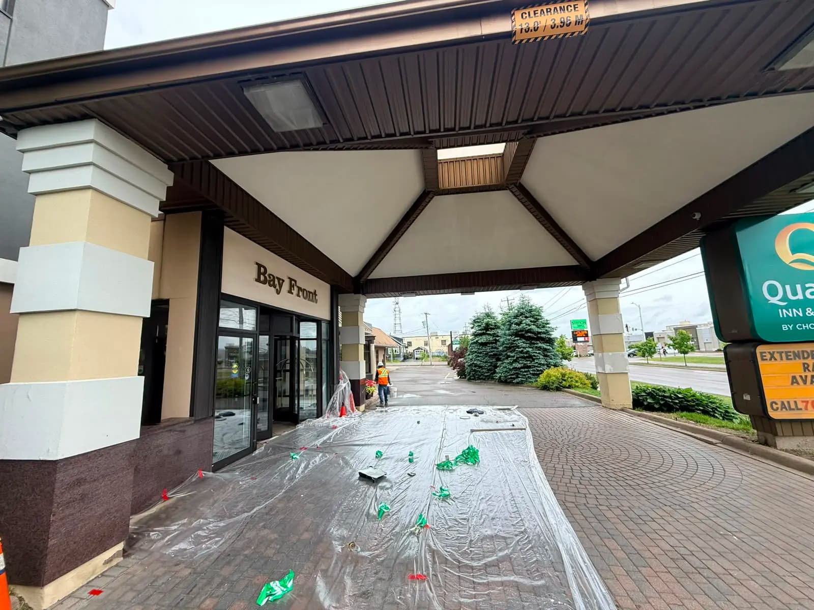 Quality Inn, Sault Ste. Marie — Entrance canopy masked and floors covered while the hotel stayed open
